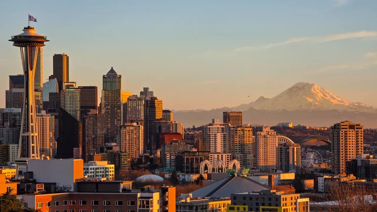 Seattle skyline with Mount Rainier in evening light.