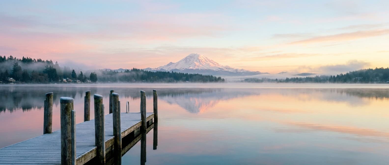 Lake Washington at dawn with Mount Rainier on the horizon, seen from Kirkland