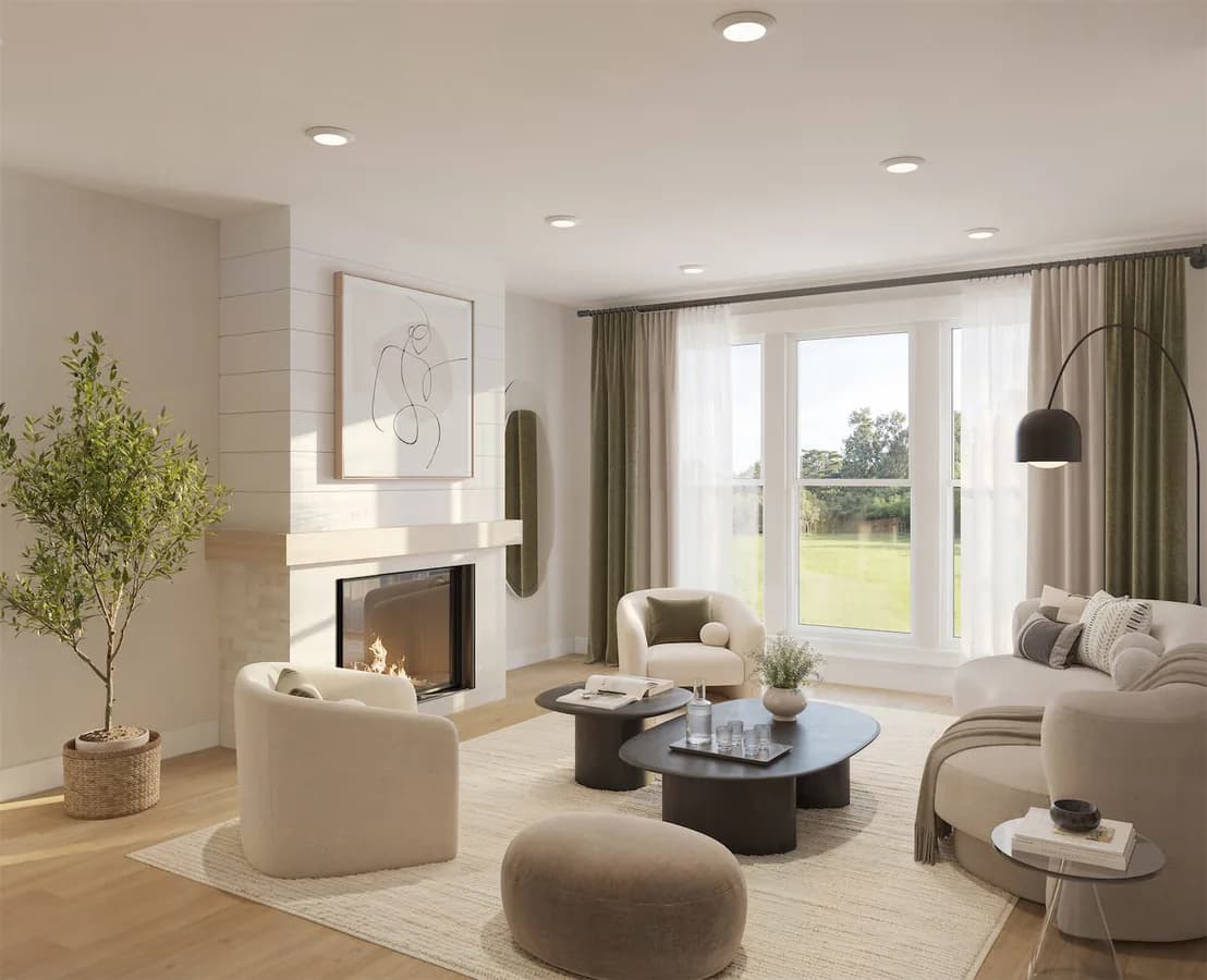 Homesite 1 living room with a fireplace, wide-plank flooring, and large windows.